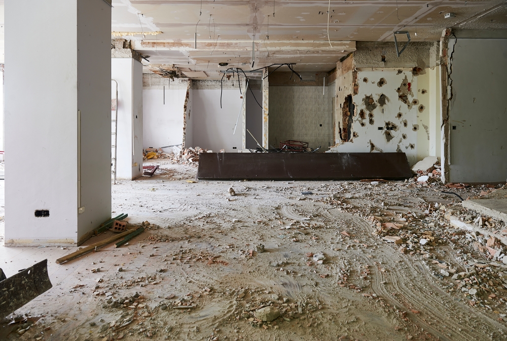 Interior,Of,A,Ground,Floor,Unit,Under,Renovation,With,Collapsed cutting-edge-concrete-cpncrete-demolition